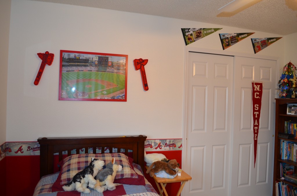 The pennants over the closet were from Timmy's 3 years playing for Navarre Youth Sports.