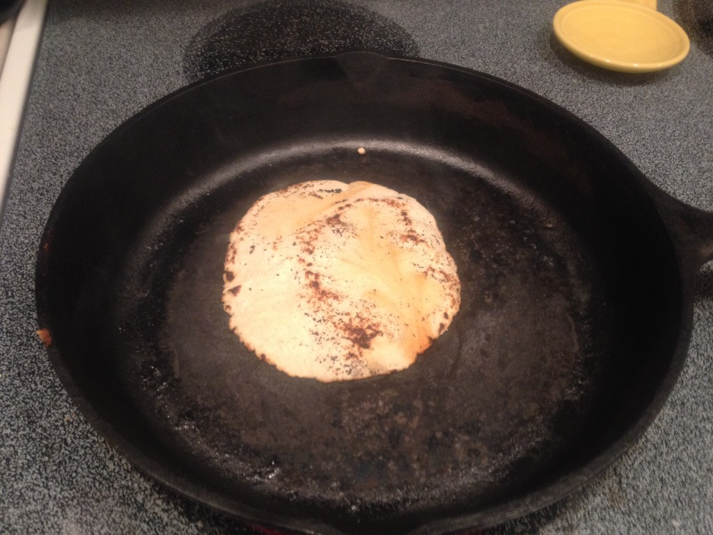 A tortilla being "dry cooked" on my cast iron skillet.